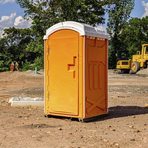 how often are the portable restrooms cleaned and serviced during a rental period in New Paris